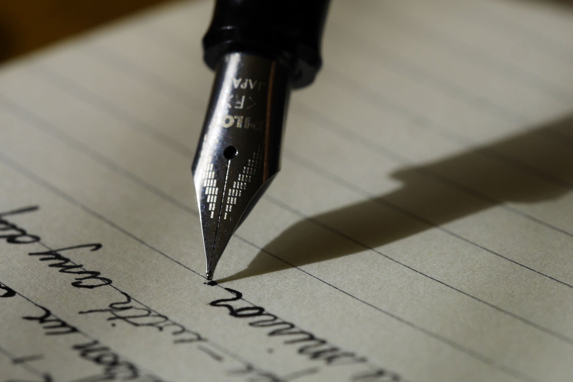 Handwriting. Image credit: Aaron Burden on Unsplash.
